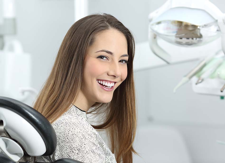 woman smiling in dental chair